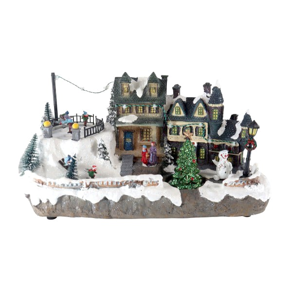 Villa navideña iluminada con nieve, figuras y casitas