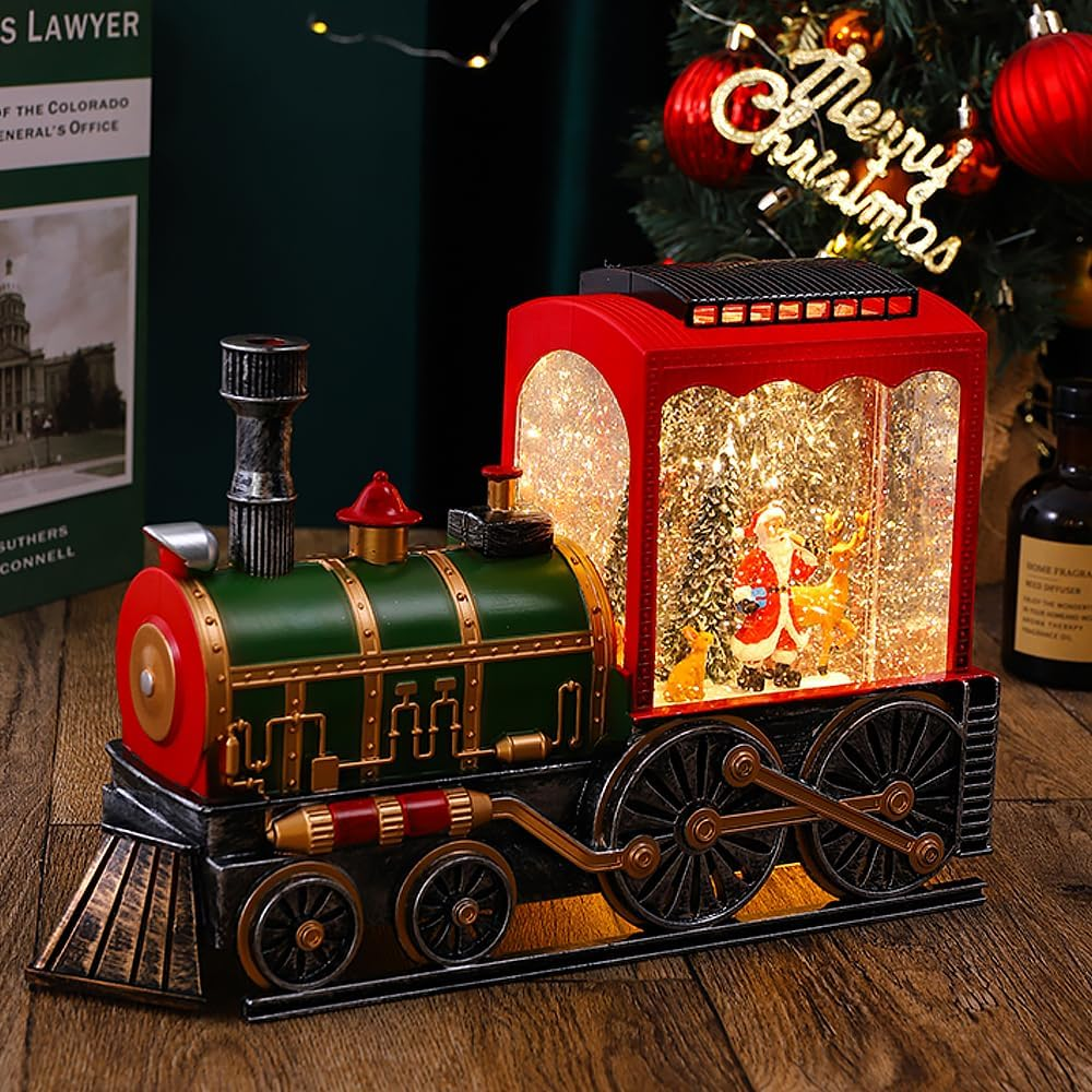 Tren navideño con luces, nieve y escena giratoria de santa claus