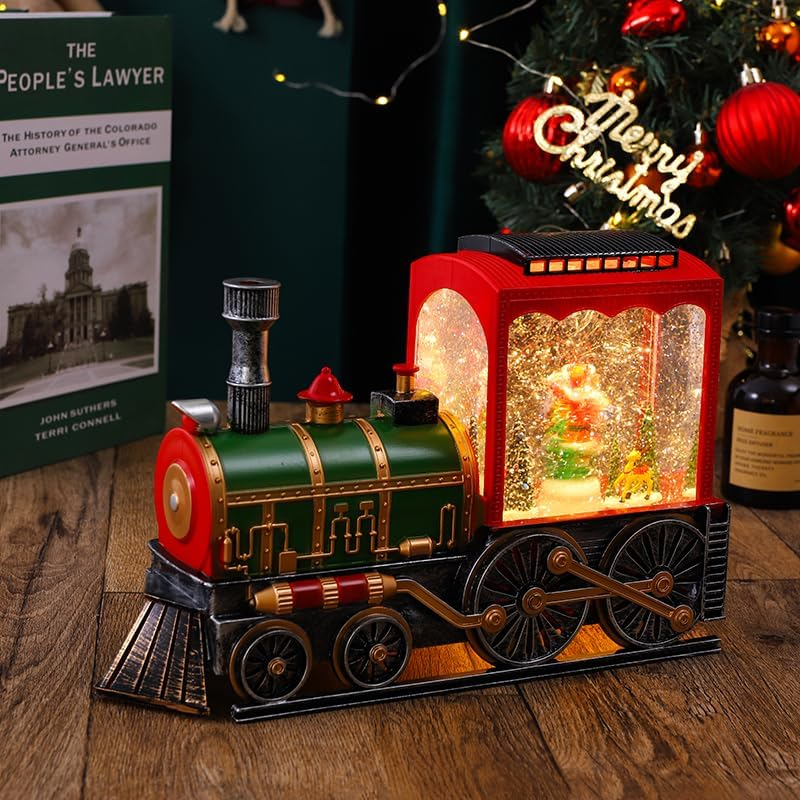 Tren navideño con luces, nieve y escena giratoria de santa claus