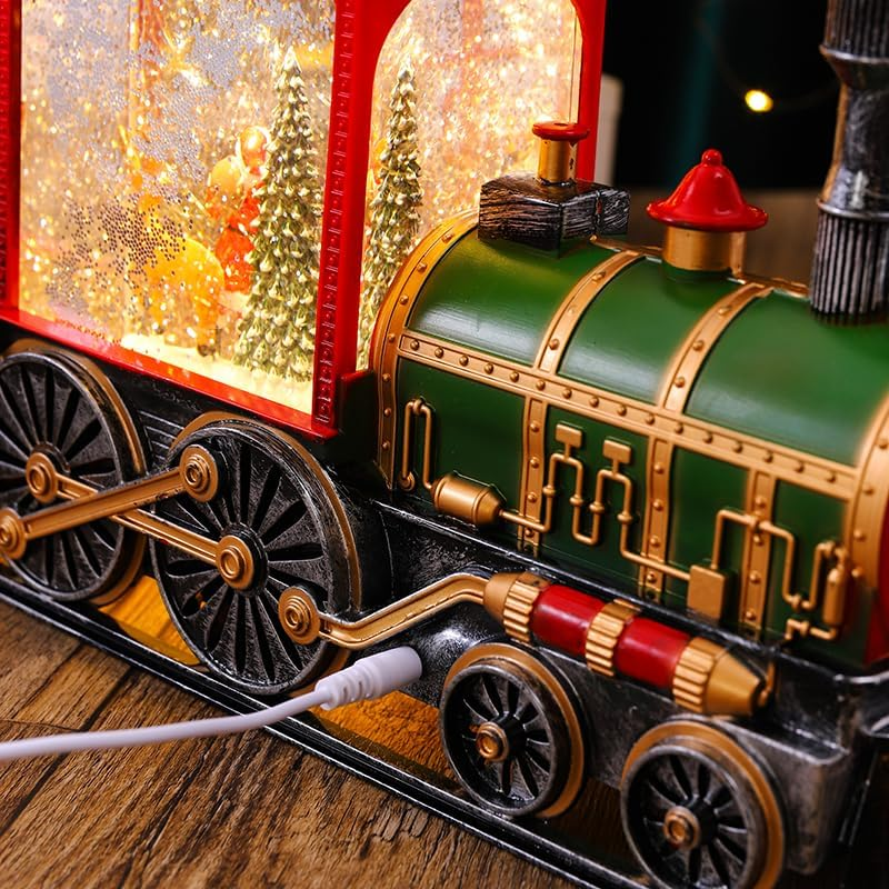 Tren navideño con luces, nieve y escena giratoria de santa claus